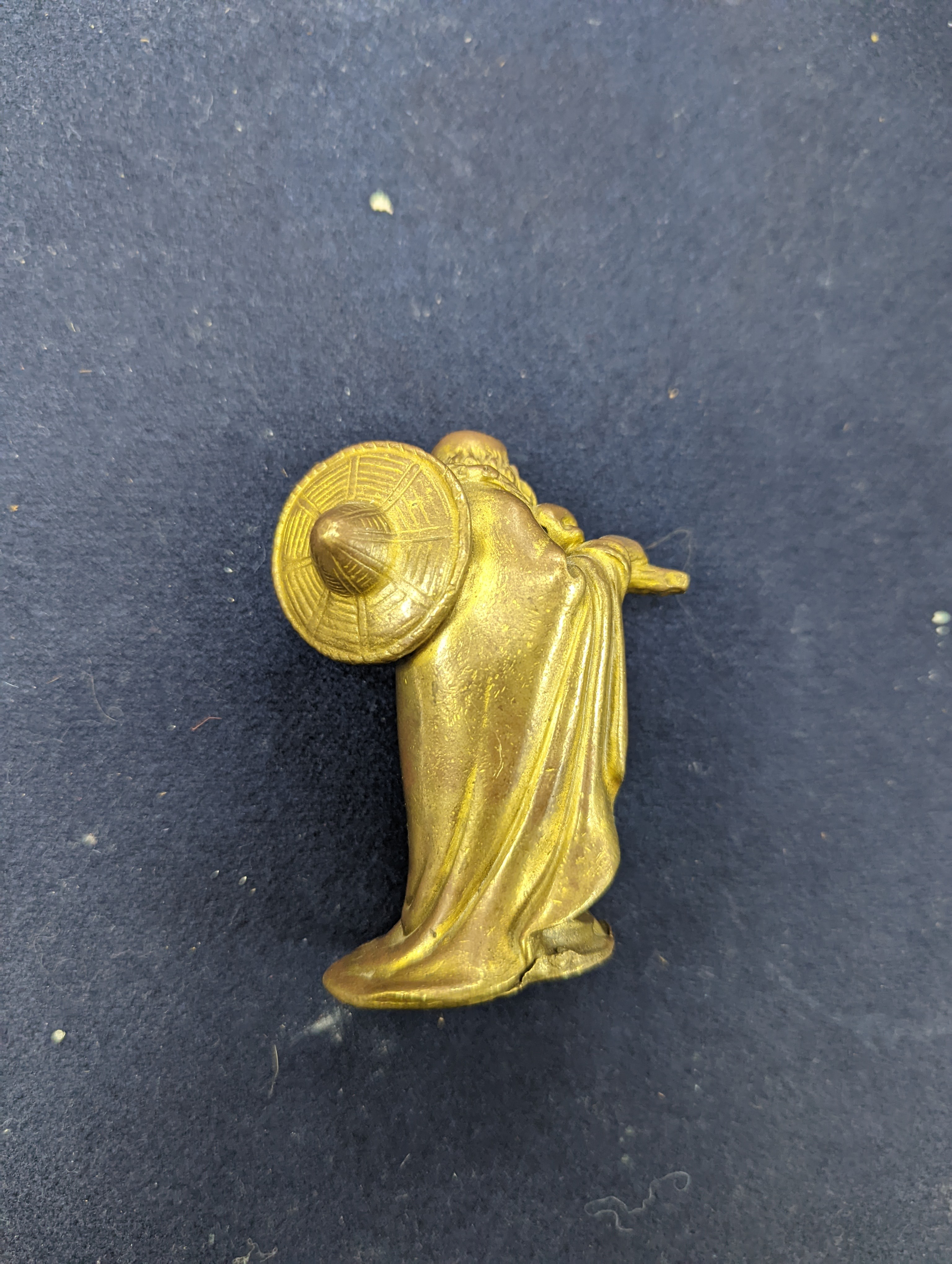 A Chinese gilt copper figure, a Chinese Dog of Fo, a bell, a censer, six Indian bronze figures and a scroll box